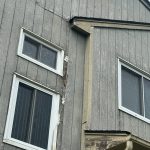 Close-up of exterior wood siding with severe peeling paint requiring restoration and preparation by Willow Tree Painting & Home Improvement in Warwick, NY.
