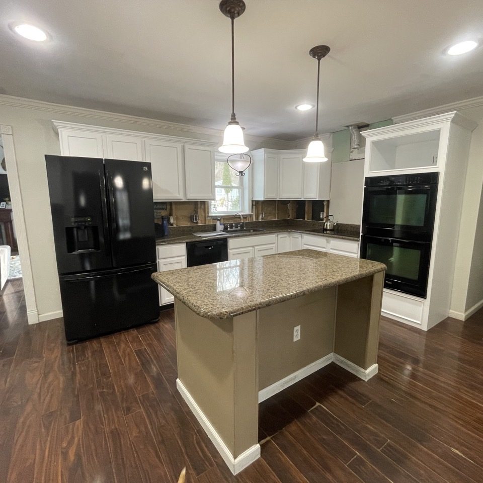 Affluent Kitchen Cabinet Refinishing New York New Jersey with newly painted white cabinets and a contrasting tan kitchen island.