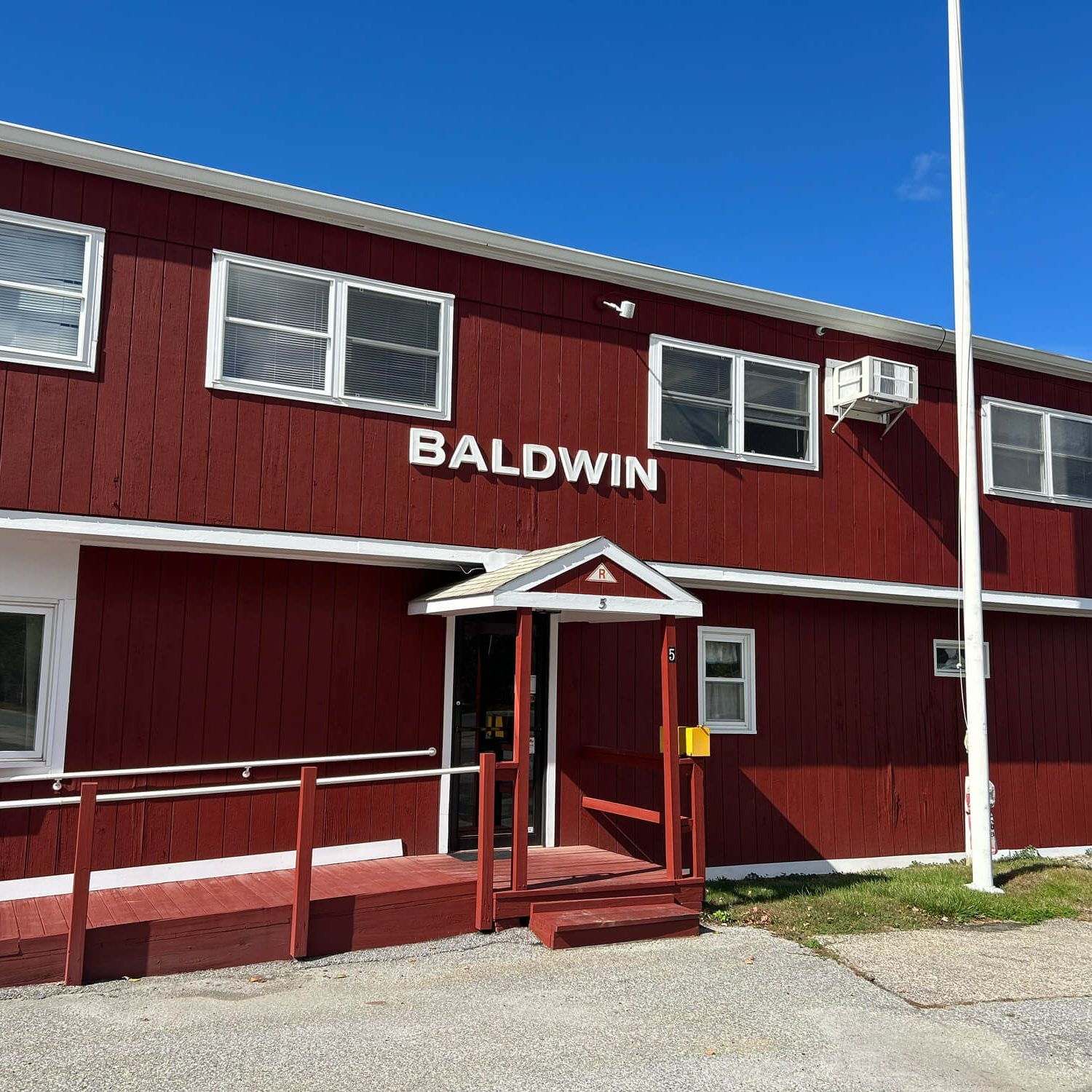 Freshly painted commercial building by Commercial Painting in Warwick, NY, showcasing clean lines and professional exterior finishes.